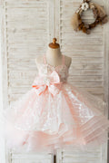 Abito da ragazza di fiori da sposa con cinturini in tulle rosa con perline incrociate sul retro Abito da cerimonia per bambini