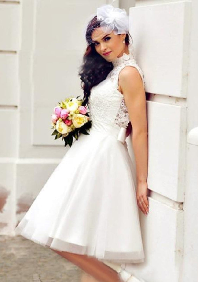 A Line/Princess Halter Neck Sleeveless Knee-Length Wedding Dress with Ruffles
