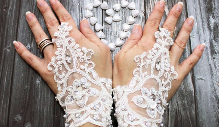 Gloves are medieval token of promise and synonymous with wedding