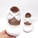 Marfil/negro/rosa pajarita lindo cuero plano bebé niña zapatos boda flor niña zapatos
