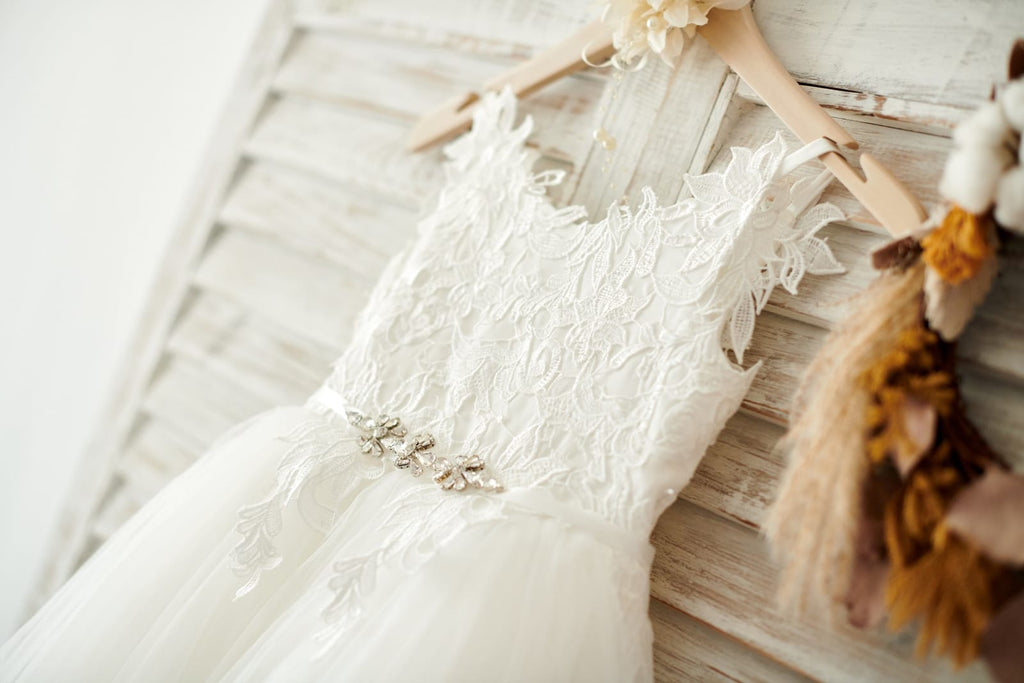 Shop spaghetti straps ivory lace bodice ruffled wedding dress from