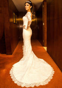 Vestido de novia de sirena de encaje marfil ilusión de manga larga, botones