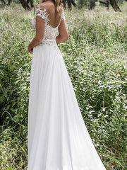 Белое кружевное шифоновое свадебное платье трапециевидного силуэта с разрезом и разрезом