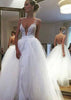 Vestido de novia de encaje con falda de tul y espalda descubierta con tirantes sexy