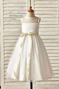 Vestido de niña de las flores de tul con lunares y escote transparente, fajín color champán