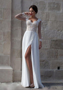 Vestido de novia con abertura en gasa y encaje de manga larga transparente, pedrería